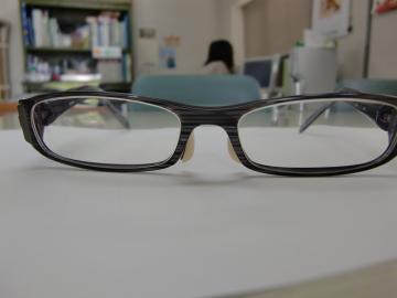 ���߂���