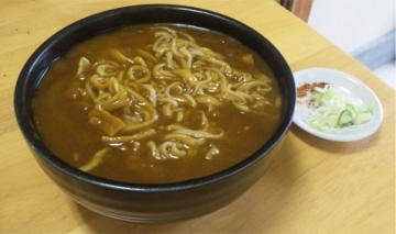 ����[����